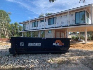BluBin dumpster at a new construction site